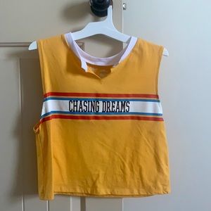 This is a stylish top that says chasing dreams.